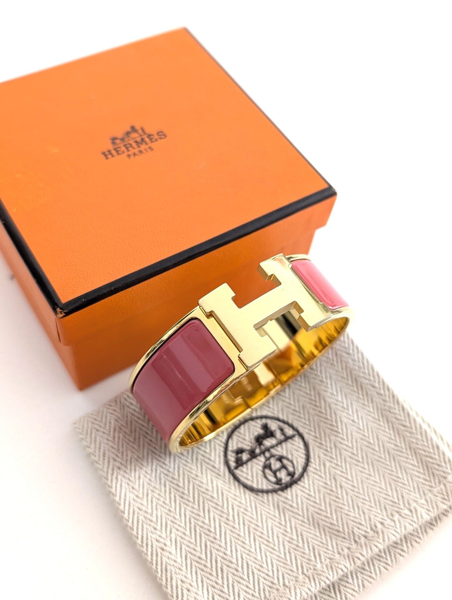 Hermes Clic Clac H bracelet in glacé brown/yellow gold