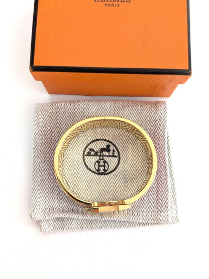 Hermes Clic Clac H bracelet in glacé brown/yellow gold