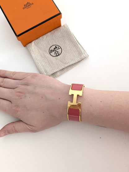 Hermes Clic Clac H bracelet in glacé brown/yellow gold